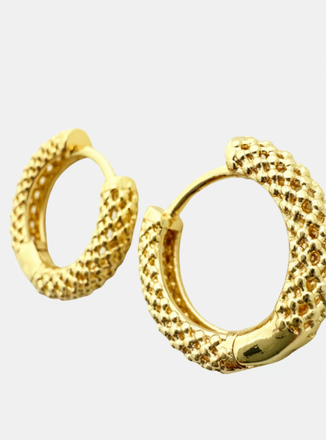 Gold Dorina Waffle Huggie Hoop Earrings with textured finish by Mare De Vetro.